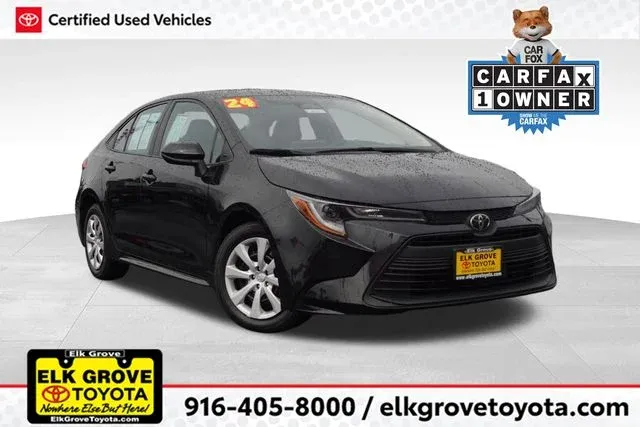 2024 Toyota Corolla LE in Black — front three-quarter view