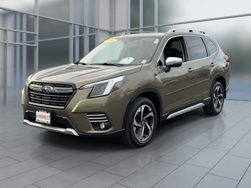 2022 Subaru Forester Touring in Autumn Green Metallic — front three-quarter view