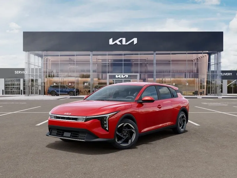 2026 Kia K4 EX in Currant Red — front three-quarter view