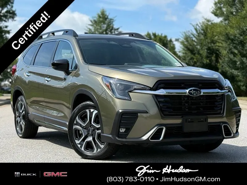 2024 Subaru Ascent Touring in Green Metallic — front three-quarter view