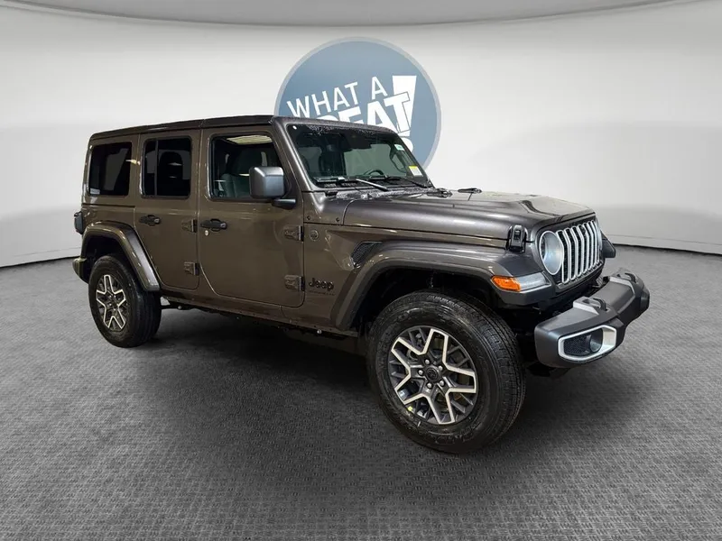 2026 Jeep Wrangler Sahara in Granite Crystal Metallic Clear-Coat Exterior Paint — front three-quarter view