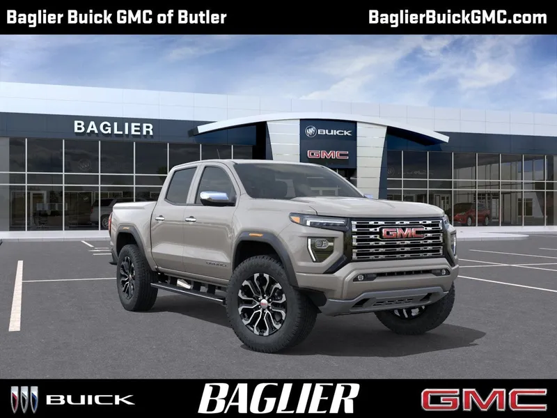 2026 GMC Canyon Denali in Coastal Dune — front three-quarter view