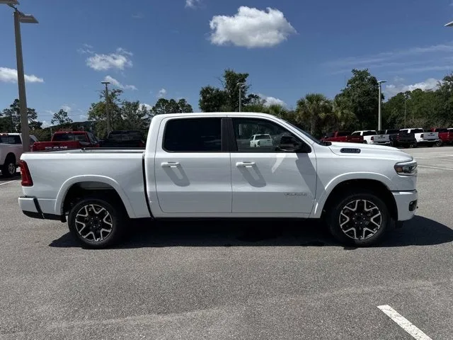 2026 RAM 1500 Laramie in Bright White Clearcoat — front three-quarter view