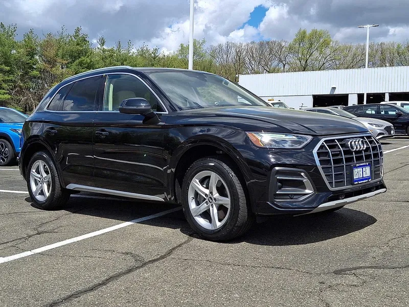 2021 Audi Q5 Premium in Brilliant Black — front three-quarter view