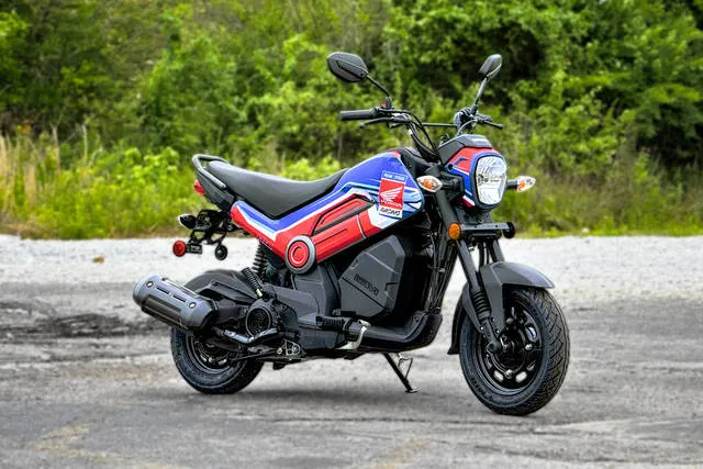 2026 Honda® Navi Blue Metallic — front three-quarter view