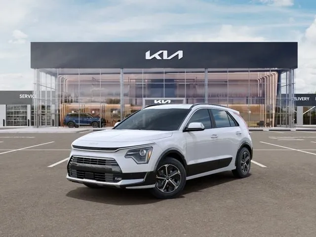 2026 Kia Niro SX ETA- AUG. 2026 in Snow White Pearl — front three-quarter view