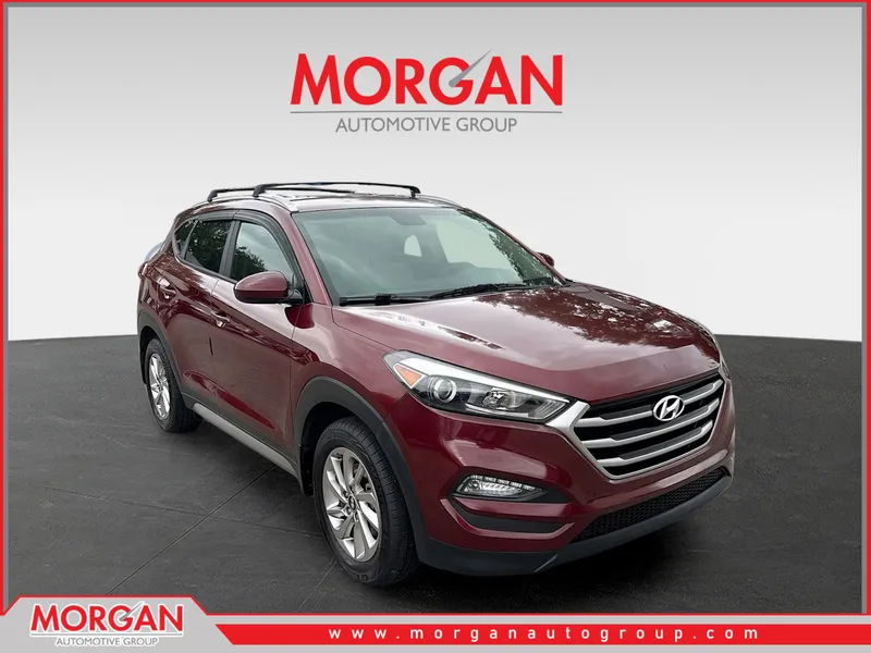 2017 Hyundai Tucson SE in Ruby Wine — front three-quarter view