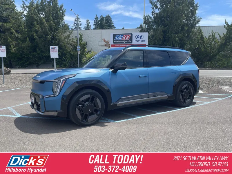 2024 Kia EV9 GT-Line in Ocean Blue Matte — front three-quarter view