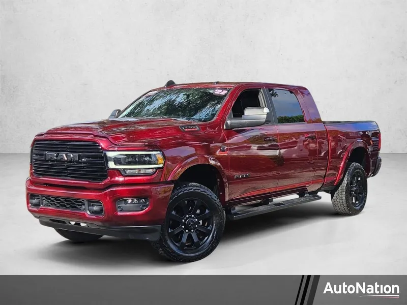 2022 RAM 2500 Laramie 4x4 Mega Cab 6'4" Box in Delmonico Red Pearlcoat — front three-quarter view