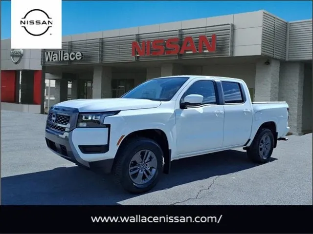 2026 Nissan Frontier SV in Glacier White Qak — front three-quarter view