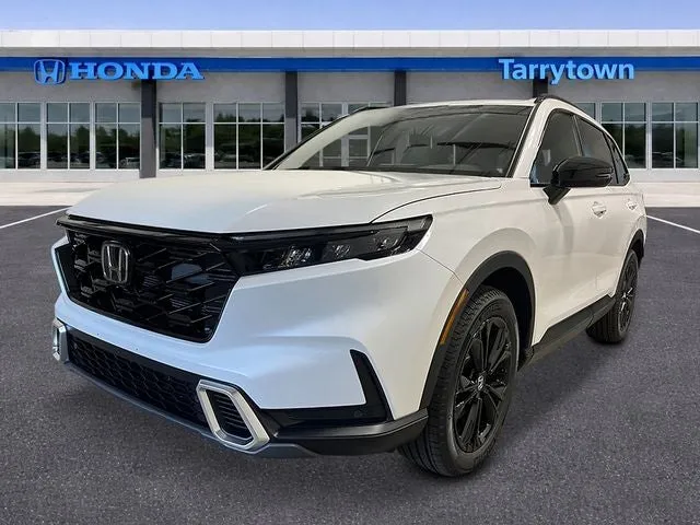 2026 Honda CR-V AWD Sport Touring Hybrid in Platinum White Pearl — front three-quarter view