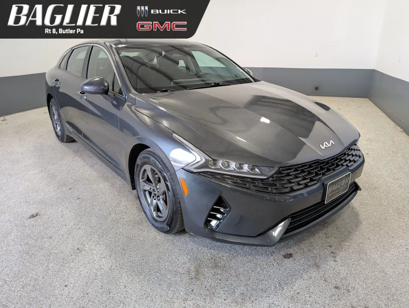 2023 Kia K5 LXS in Gray — front three-quarter view