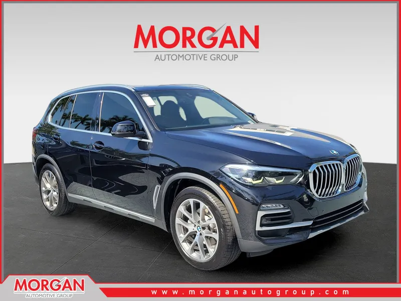 2021 BMW X5 xDrive40i in Black Sapphire Metallic — front three-quarter view