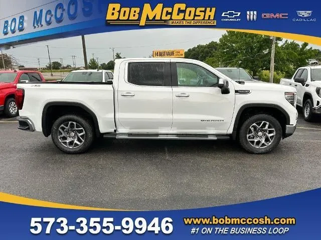 2026 GMC Sierra 1500 SLT in Summit White — front three-quarter view