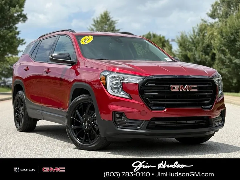 2023 GMC Terrain SLT in Volcanic Red — front three-quarter view