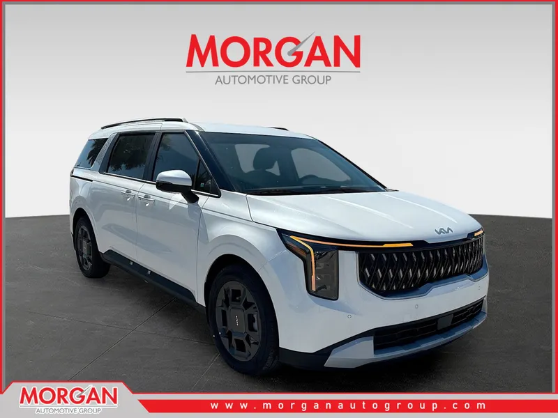 2026 Kia Carnival Hybrid EX in Snow White Pearl — front three-quarter view