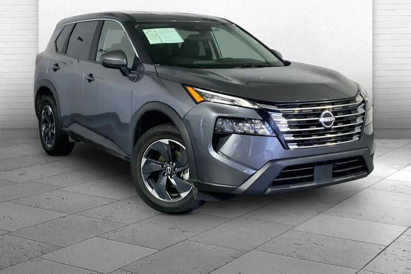 2025 Nissan Rogue SV in Gun Metallic — front three-quarter view