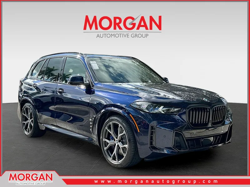 2026 BMW X5 xDrive50e in Tanzanite Blue II Metallic — front three-quarter view