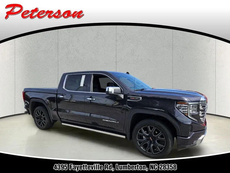 2023 GMC Sierra 1500 4WD Crew Cab Short Box Denali in Titanium Rush Metallic — front three-quarter view