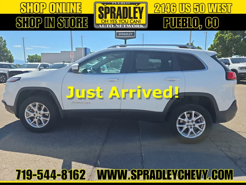 2014 Jeep Cherokee Latitude in White — front three-quarter view