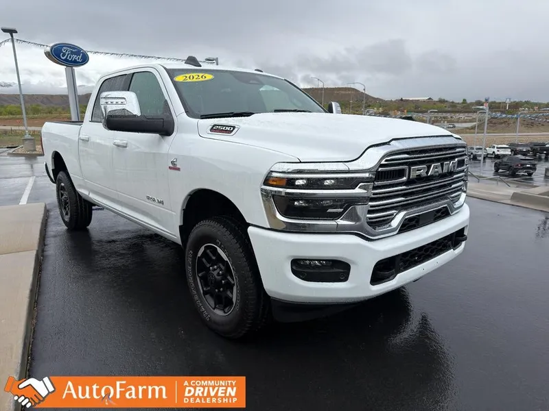 2026 RAM 2500 Laramie in Bright White Clearcoat — front three-quarter view