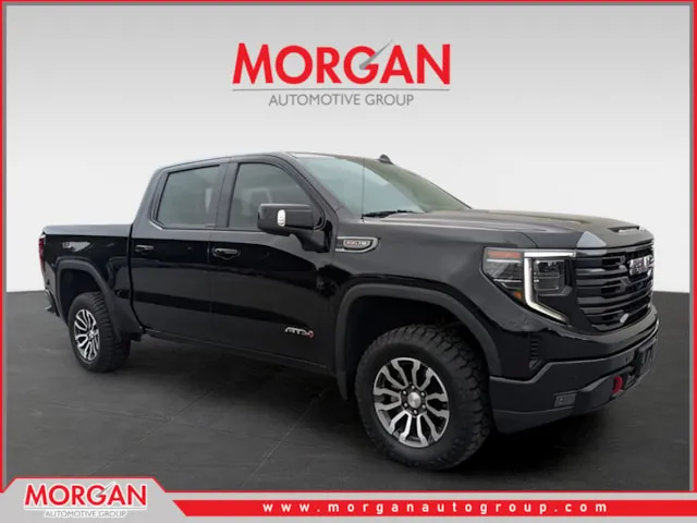 2023 GMC Sierra 1500 AT4 in Black — front three-quarter view