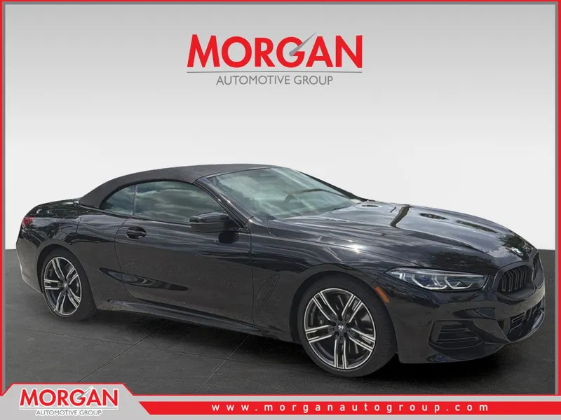 2024 BMW 8 Series 840i in Black — front three-quarter view