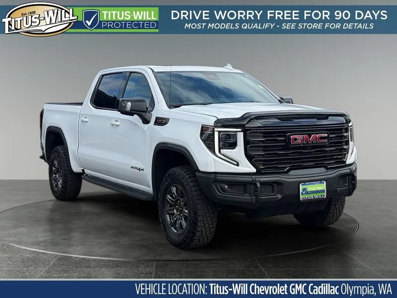 2024 GMC Sierra 1500 AT4X in Summit White — front three-quarter view