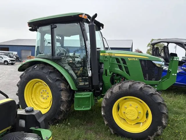 2026 John Deere 5075E with premium cab — front three-quarter view