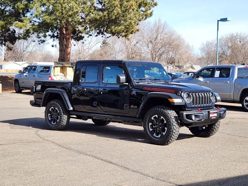2026 Jeep Gladiator GLADIATOR RUBICON X 4X4 in Black Clear-Coat Exterior Paint — front three-quarter view