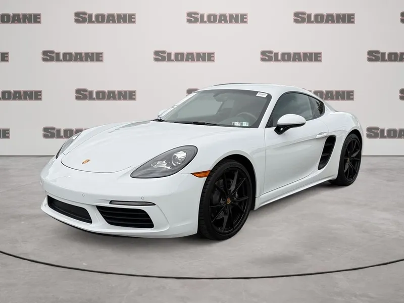 2019 Porsche 718 Cayman Base in White — front three-quarter view