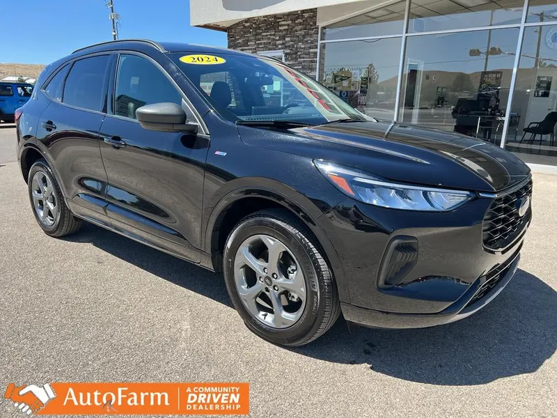 2024 Ford Escape ST-Line in Agate Black Metallic — front three-quarter view