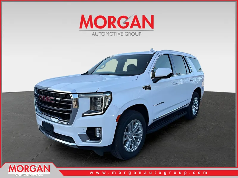2023 GMC Yukon SLT in Summit White — front three-quarter view