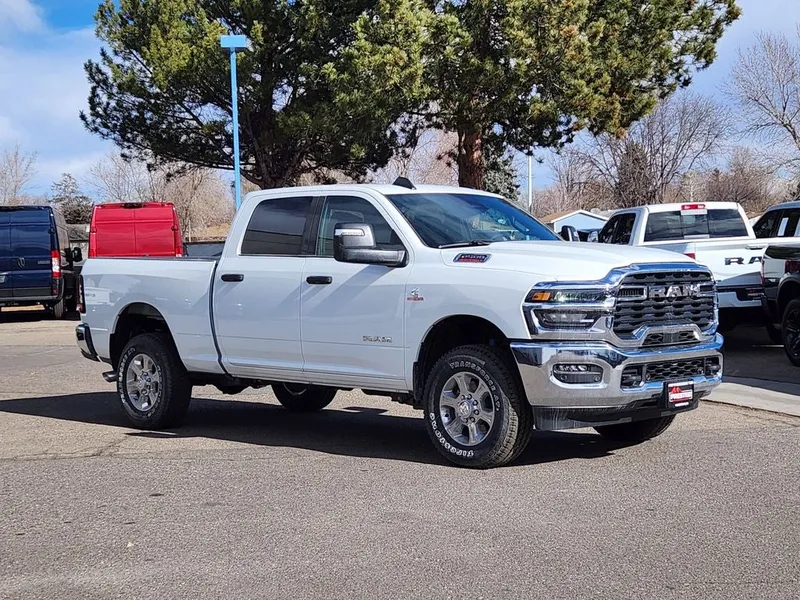 2026 RAM 2500 RAM 2500 BIG HORN CREW CAB 4X4 6'4' BOX in Bright White Clear-Coat Exterior Paint — front three-quarter view