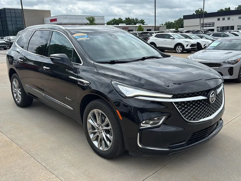 2024 Buick Enclave Avenir in Ebony Twilight Metallic — front three-quarter view