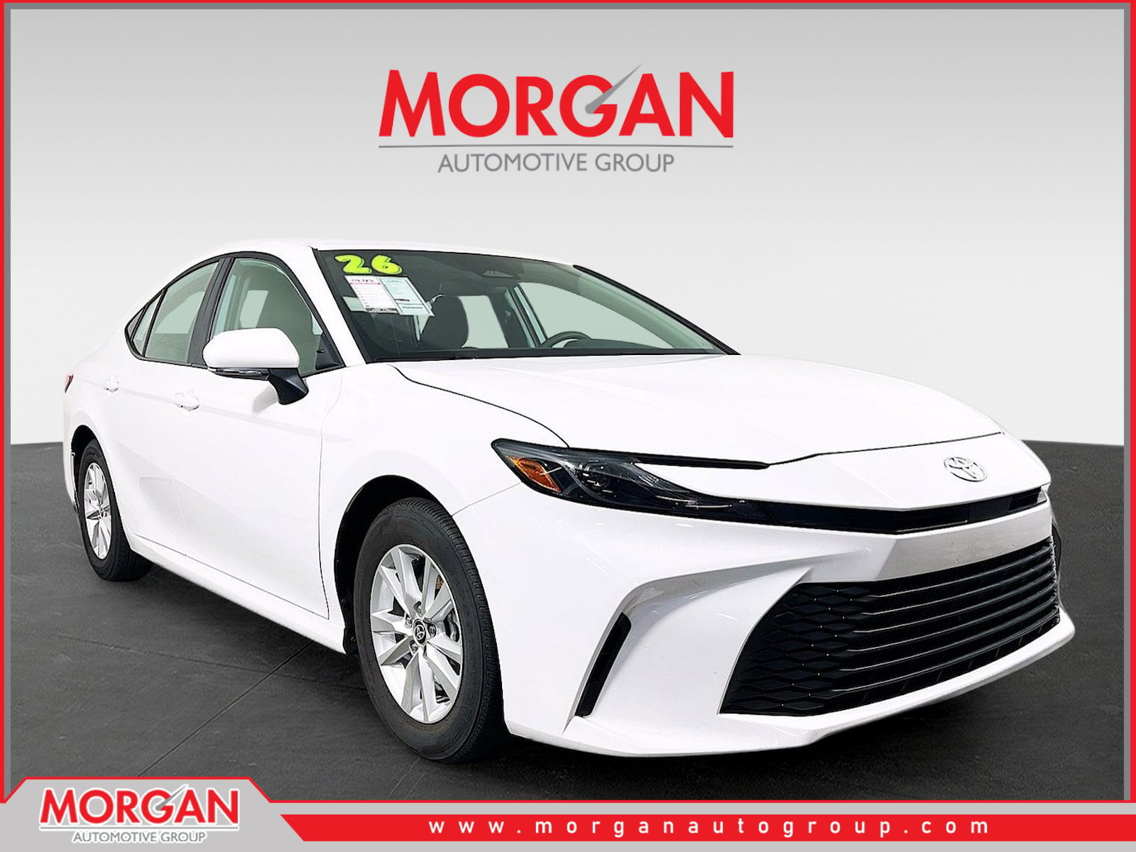 2026 Toyota Camry LE in White — front three-quarter view