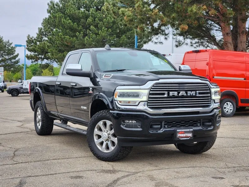 2022 RAM 3500 Laramie Crew Cab 4x4 8' Box in Diamond Black Crystal Pearlcoat — front three-quarter view