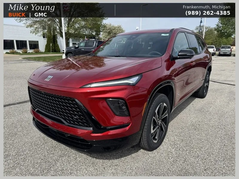 2026 Buick Enclave Sport Touring in Cherry Red Tintcoat — front three-quarter view