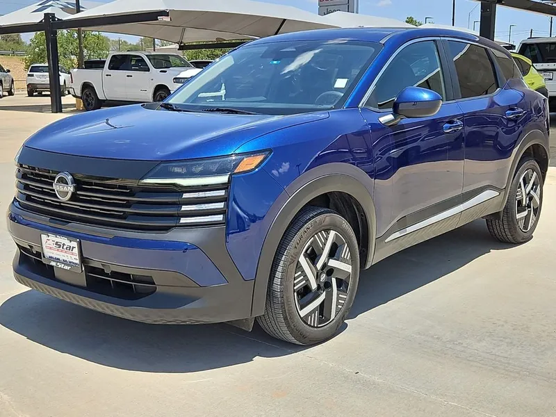 2025 Nissan Kicks SV in Deep Blue Pearl — front three-quarter view
