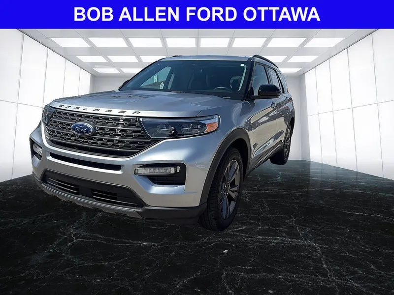 2024 Ford Explorer XLT in Iconic Silver — front three-quarter view