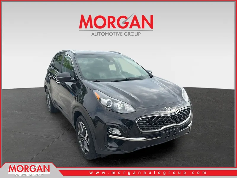2020 Kia Sportage EX in Black Cherry Pearl — front three-quarter view