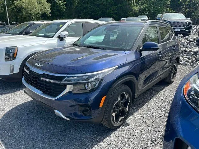 2024 Kia Seltos EX IVT AWD in Dark Ocean Blue — front three-quarter view
