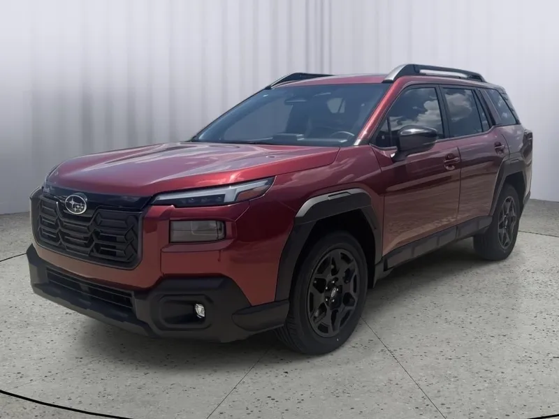 2026 Subaru OUTBACK Limited in Crimson Red Pearl — front three-quarter view