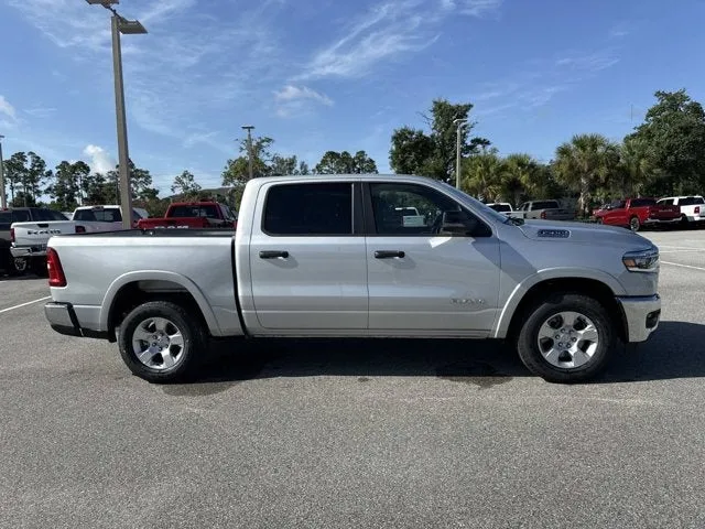 2026 RAM 1500 Big Horn in Silver Zynith — front three-quarter view