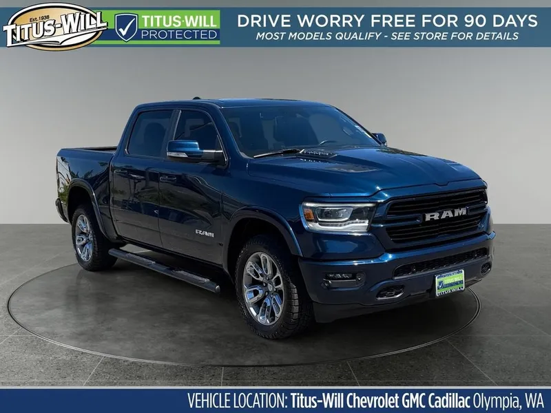 2021 RAM 1500 Laramie Crew Cab 4x4 5'7" Box in Blue — front three-quarter view