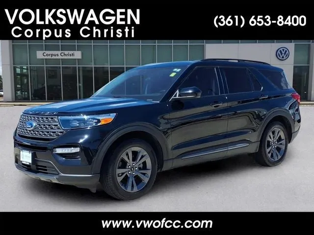 2024 Ford Explorer XLT in Black Metallic — front three-quarter view