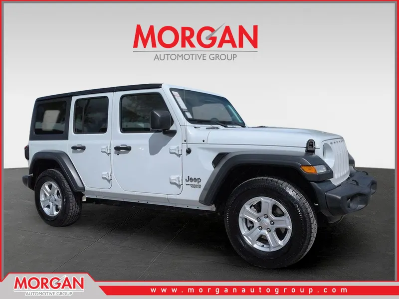 2018 Jeep Wrangler Unlimited Sport S in White — front three-quarter view