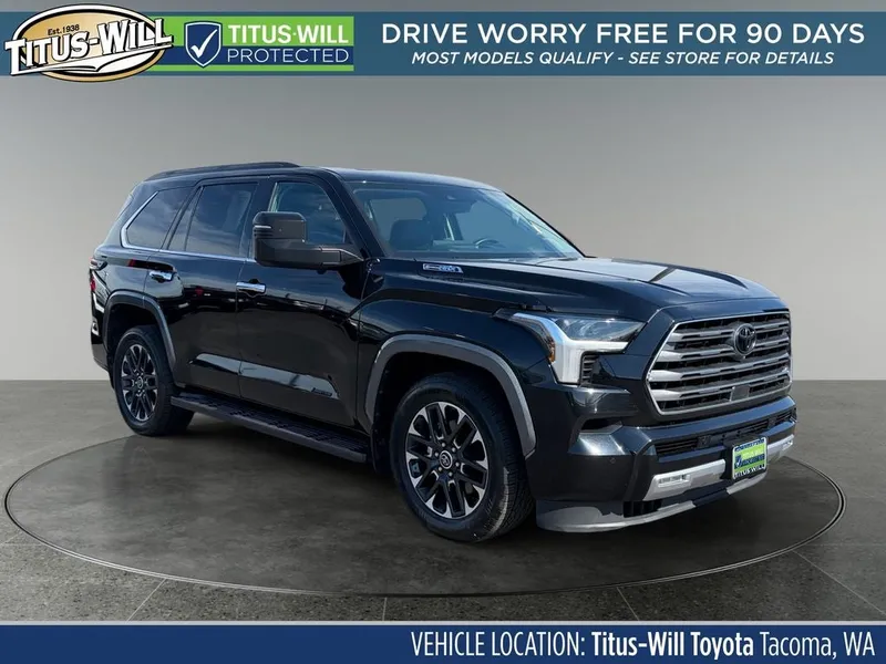 2023 Toyota Sequoia Limited in Midnight Black Metal — front three-quarter view