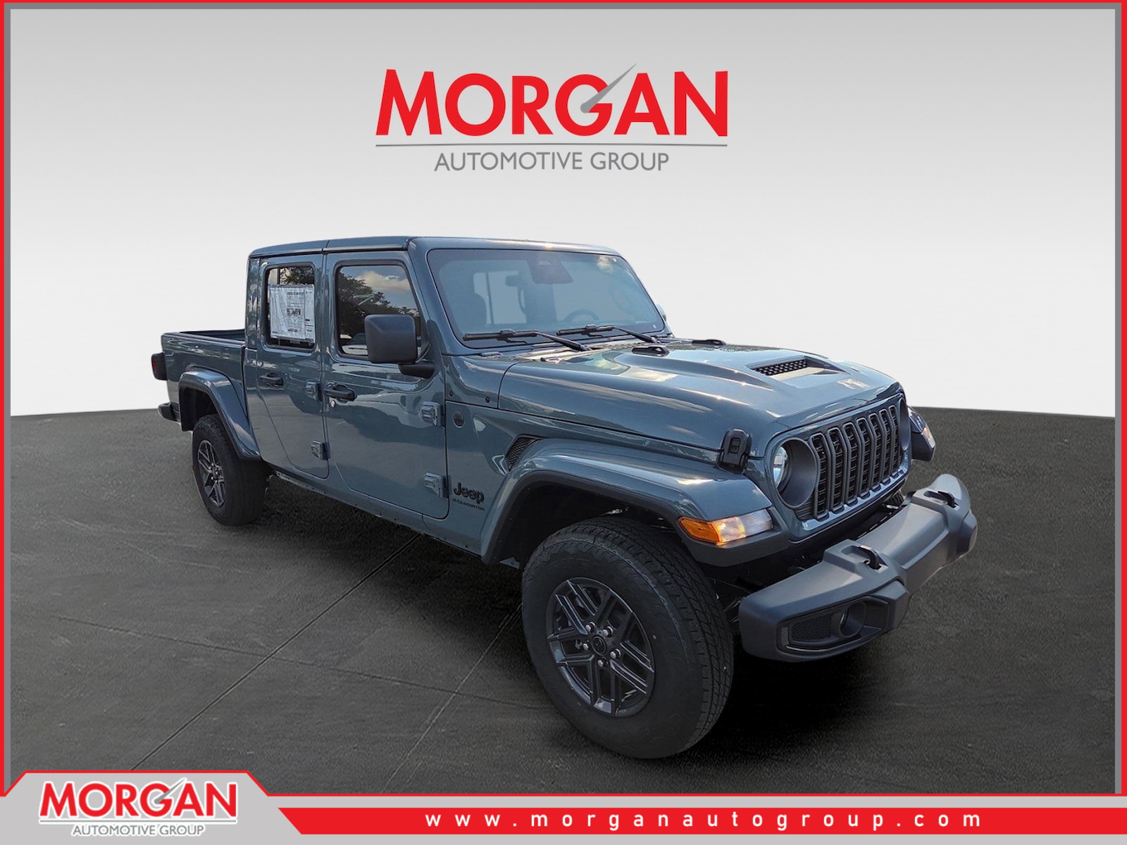 2026 Jeep Gladiator Sport S in Gray — front three-quarter view