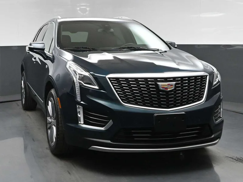 2024 Cadillac XT5 Premium Luxury in Emerald Lake Metallic — front three-quarter view